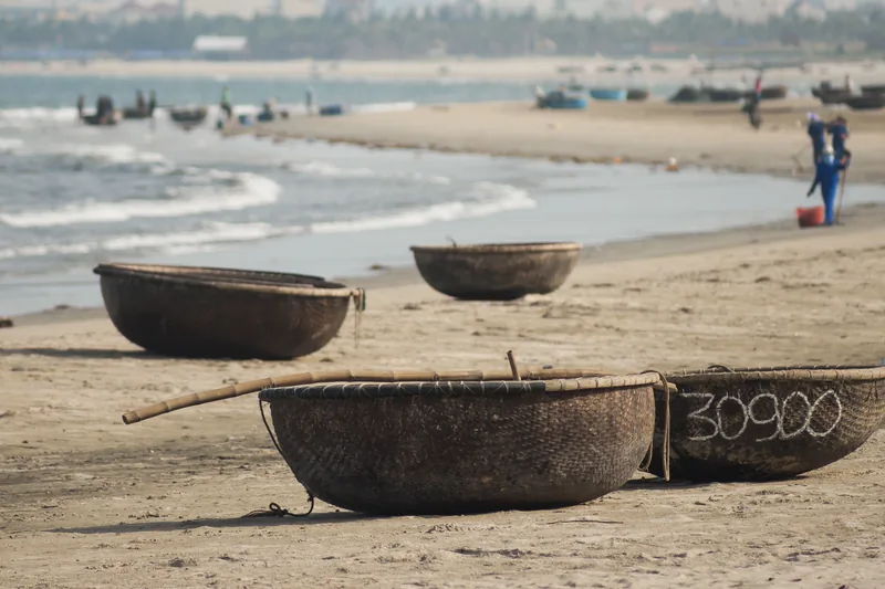 Round basket boats (coracles) on the water near Da Nang